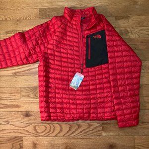 Men's red North Face quarter zip pull over